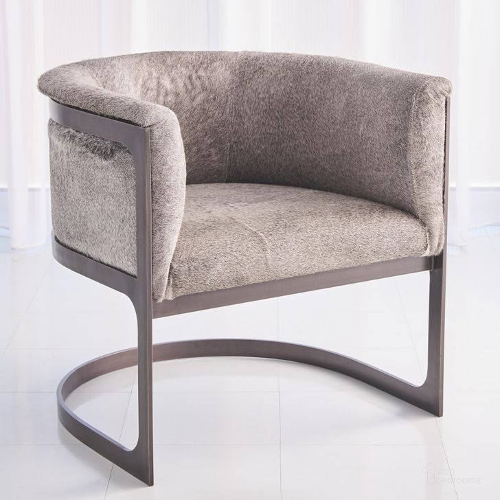 The appearance of Regan Barrel Chair With Grey Hair On Hide Antique Gunmetal In Gray designed by Global Views in the modern / contemporary interior design. This gray piece of furniture  was selected by 1StopBedrooms from Regan Collection to add a touch of cosiness and style into your home. Sku: 7.91093. Product Type: Chair. Material: Iron. Image1
