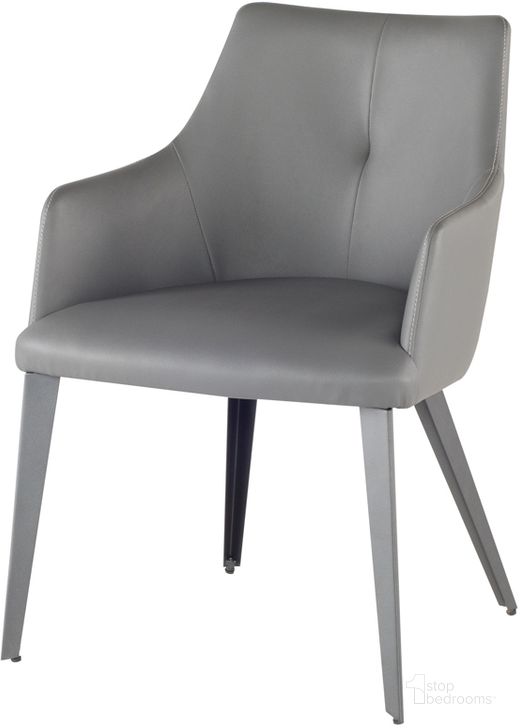 The appearance of Renee Grey Naugahyde Dining Chair designed by Nuevo in the modern / contemporary interior design. This grey piece of furniture  was selected by 1StopBedrooms from Renee Collection to add a touch of cosiness and style into your home. Sku: HGNE102. Product Type: Dining Chair. Material: Naugahyde. Image1