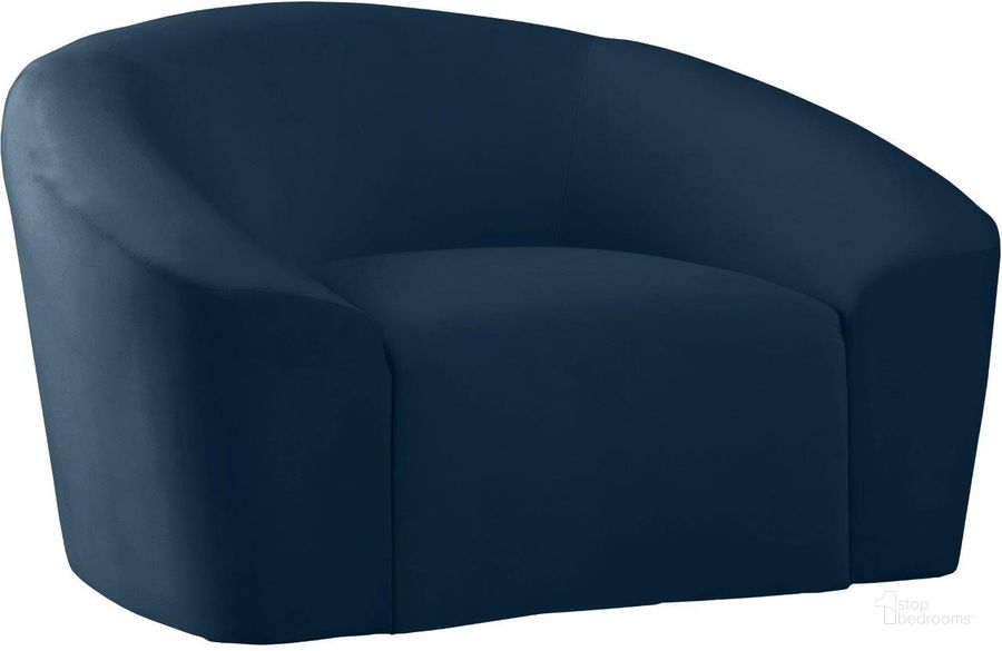 The appearance of Riley Navy Velvet Chair designed by Meridian in the modern / contemporary interior design. This navy velvet piece of furniture  was selected by 1StopBedrooms from Riley Collection to add a touch of cosiness and style into your home. Sku: 610Navy-C. Product Type: Living Room Chair. Material: Velvet. Image1