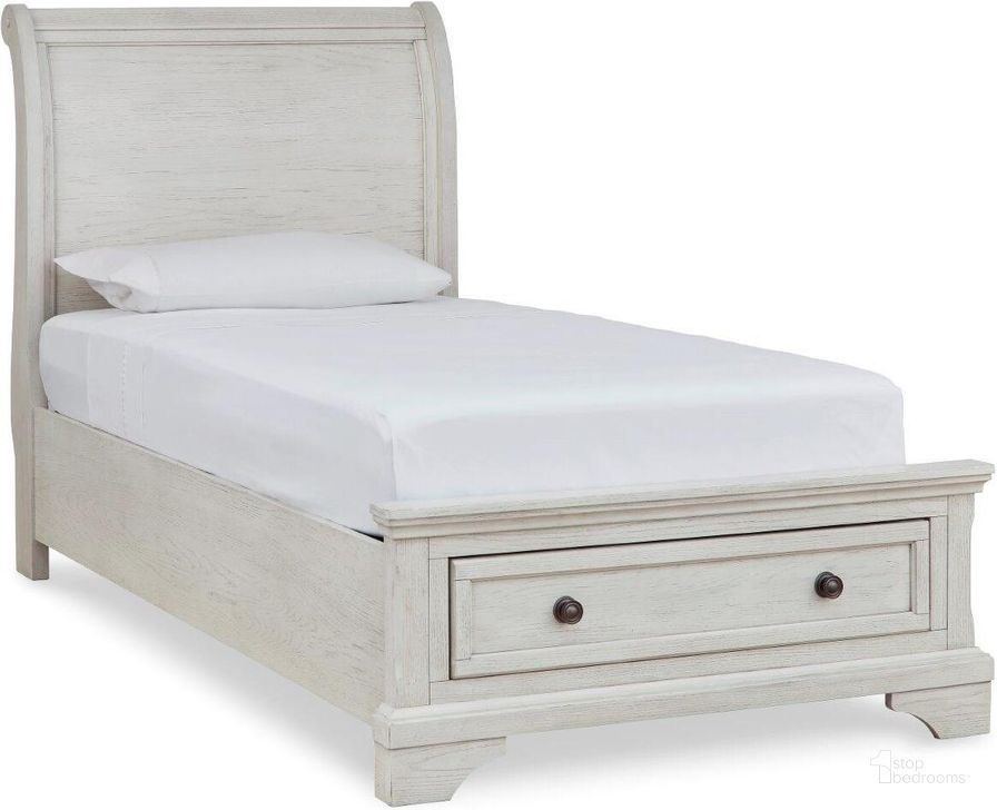 The appearance of Robbinsdale Antique White Twin Sleigh Storage Bed designed by Signature Design by Ashley in the transitional interior design. This antique white piece of furniture  was selected by 1StopBedrooms from Robbinsdale Collection to add a touch of cosiness and style into your home. Sku: B742-183;B742-52S;B742-53. Bed Type: Storage Bed. Material: Wood. Product Type: Storage Bed. Bed Size: Twin. Image1