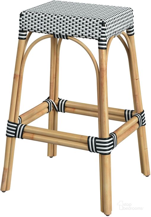 The appearance of Robias Rectangular Rattan 30 Inch Bar Stool In White and Black Dot designed by Butler Specialty Company in the coastal interior design. This white and black piece of furniture  was selected by 1StopBedrooms from Robias Collection to add a touch of cosiness and style into your home. Sku: 5604295. Material: Rattan. Product Type: Barstool. Image1