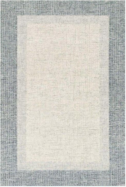 The appearance of Rosina Grey/Blue Rug ROSIROI-01GYBB26D0 designed by Loloi Rugs in the modern / contemporary interior design. This grey and blue piece of furniture  was selected by 1StopBedrooms from Rosina Collection to add a touch of cosiness and style into your home. Sku: ROSIROI-01GYBB26D0. Material: Wool. Product Type: Rug. Image1