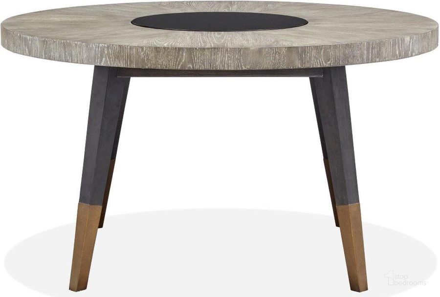 The appearance of Ryker Nocturn Black And Coventry Grey Round Dining Table designed by Magnussen in the modern / contemporary interior design. This black and gray piece of furniture  was selected by 1StopBedrooms from Ryker Collection to add a touch of cosiness and style into your home. Sku: D5013-24. Table Base Style: Legs. Table Top Shape: Round. Product Type: Dining Table. Image1