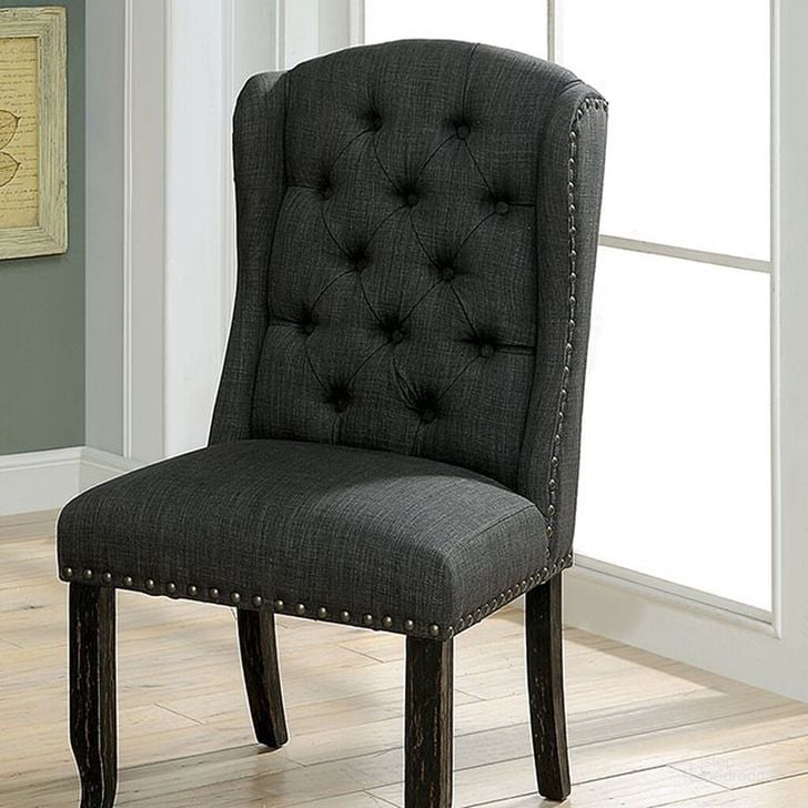 The appearance of Sania Wingback Chair Set of 2 In Dark Gray designed by Furniture of America in the rustic / southwestern interior design. This dark gray piece of furniture  was selected by 1StopBedrooms from Sania Collection to add a touch of cosiness and style into your home. Sku: CM3324BK-GY-SC-2PK. Material: Wood. Product Type: Accent Chair. Image1
