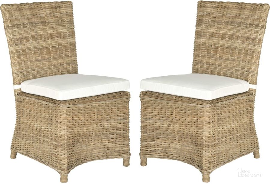 The appearance of Sebesi Natural Rattan Side Chair designed by Safavieh in the modern / contemporary interior design. This natural piece of furniture  was selected by 1StopBedrooms from Safavieh FOX Collection to add a touch of cosiness and style into your home. Sku: FOX1600A-SET2. Product Type: Dining Chair. Material: Rattan. Image1