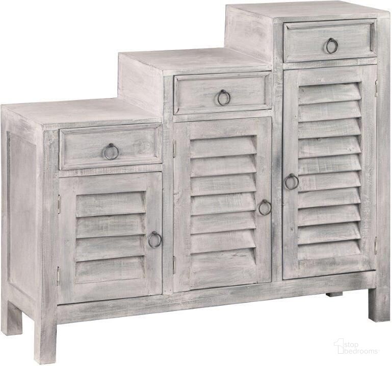 The appearance of Shabby Chic Cottage Distressed Light Gray Three Tiered Shutter Cabinet designed by Sunset Trading in the country / farmhouse interior design. This gray piece of furniture  was selected by 1StopBedrooms from Shabby Chic Cottage Collection to add a touch of cosiness and style into your home. Sku: CC-CAB1181LD-SW. Material: Wood. Product Type: Cabinet. Image1
