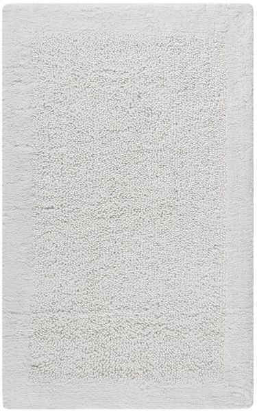 The appearance of Shadow Plush Bath Mat Set of 2 in White PMB623W-2745-SET2 designed by Safavieh in the modern / contemporary interior design. This white piece of furniture  was selected by 1StopBedrooms from Shadow Collection to add a touch of cosiness and style into your home. Sku: PMB623W-2745-SET2. Product Type: Rug. Material: Cotton. Image1