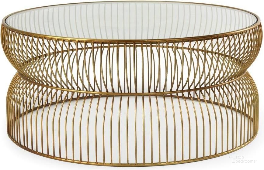 The appearance of Shani Round Gold Metal With Glass Coffee Table designed by Mercana in the modern / contemporary interior design. This gold piece of furniture  was selected by 1StopBedrooms from Shani Collection to add a touch of cosiness and style into your home. Sku: 70090. Material: Metal. Product Type: Coffee Table. Image1