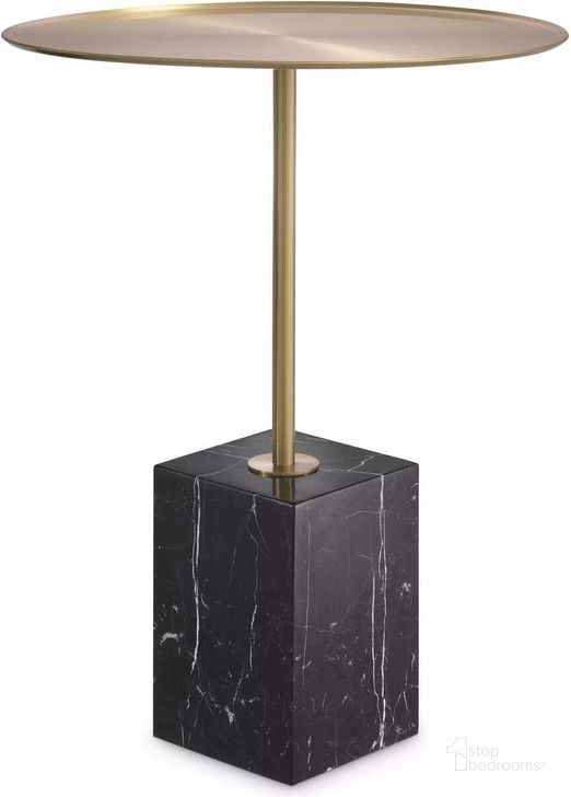 The appearance of Side Table Cole Brushed Brass Finish Black Marble designed by Eichholtz in the modern / contemporary interior design. This brass piece of furniture  was selected by 1StopBedrooms from Cole Collection to add a touch of cosiness and style into your home. Sku: 115544. Material: Marble. Product Type: Side Table. Image1