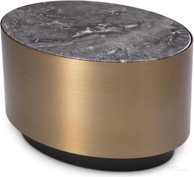 The appearance of Side Table Porter Oval Brushed Brass Finish Grey Marble designed by Eichholtz in the modern / contemporary interior design. This brass piece of furniture  was selected by 1StopBedrooms from Porter Collection to add a touch of cosiness and style into your home. Sku: 116457A;116457B. Product Type: Side Table. Image1