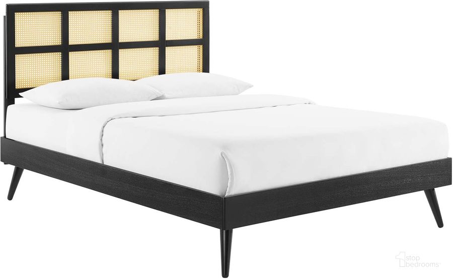 The appearance of Sidney Cane and Wood Queen Platform Bed With Splayed Legs In Black designed by Modway in the modern / contemporary interior design. This black piece of furniture  was selected by 1StopBedrooms from Sidney Collection to add a touch of cosiness and style into your home. Sku: MOD-6370-BLK. Bed Type: Platform Bed. Product Type: Platform Bed. Bed Size: Queen. Material: Rubberwood. Image1