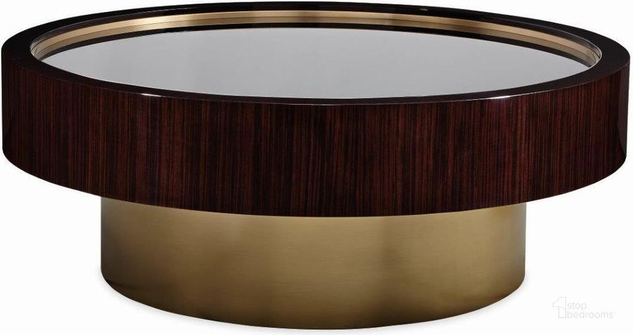 The appearance of Caracole Signature Urban Anonymous Cocktail Table designed by Caracole in the modern / contemporary interior design. This brass piece of furniture  was selected by 1StopBedrooms from Signature Urban Collection to add a touch of cosiness and style into your home. Sku: SIG-418-405. Material: Wood. Product Type: Cocktail Table. Image1