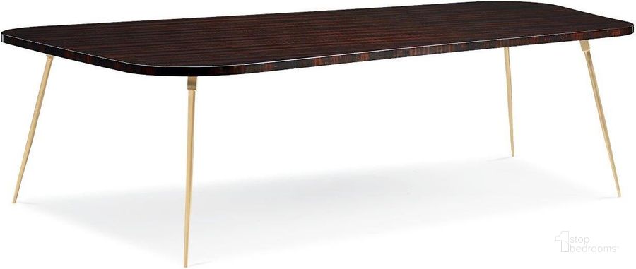 The appearance of Caracole Signature Urban Geo Modern Cocktail Table - Large Dsc designed by Caracole in the transitional interior design. This brass piece of furniture  was selected by 1StopBedrooms from Signature Urban Collection to add a touch of cosiness and style into your home. Sku: SIG-418-401. Product Type: Cocktail Table. Material: Brass. Image1