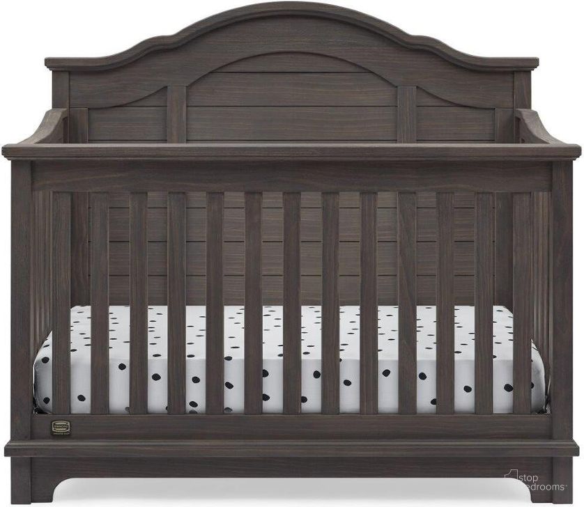 The appearance of Simmons Kids Asher 6 In 1 Convertible Crib With Toddler Rail With Greenguard Gold Certified In Rustic Grey designed by Delta Children in the country / farmhouse interior design. This rustic gray piece of furniture  was selected by 1StopBedrooms from Asher Collection to add a touch of cosiness and style into your home. Sku: W346150-084. Material: Wood. Product Type: Crib. Image1