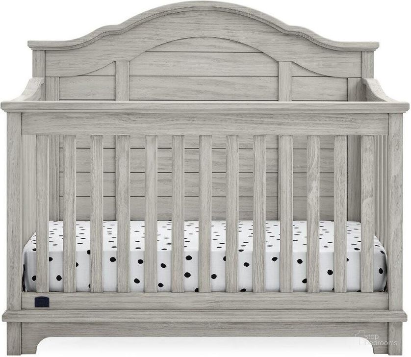 The appearance of Simmons Kids Asher 6 In 1 Convertible Crib With Toddler Rail With Greenguard Gold Certified In Rustic Mist designed by Delta Children in the country / farmhouse interior design. This rustic piece of furniture  was selected by 1StopBedrooms from Asher Collection to add a touch of cosiness and style into your home. Sku: W346150-1373. Material: Wood. Product Type: Crib. Image1