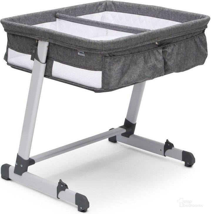 The appearance of Simmons Kids By The Bed Twin City Sleeper Bassinet In Grey Tweed designed by Delta Children in the modern / contemporary interior design. This grey piece of furniture  was selected by 1StopBedrooms from  to add a touch of cosiness and style into your home. Sku: 25507-2012. Material: Metal. Product Type: Crib. Image1