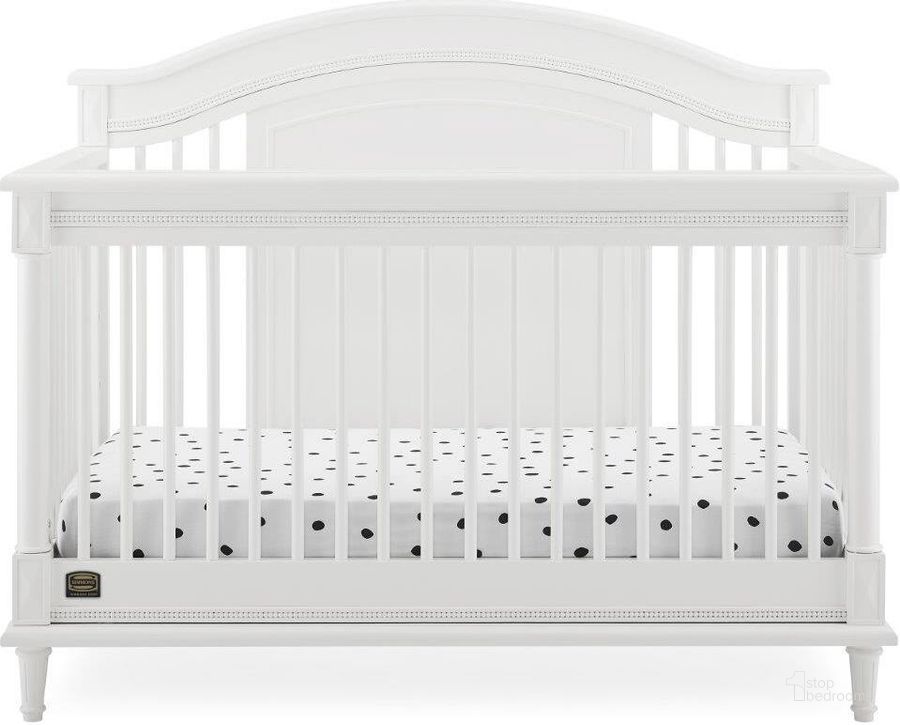 The appearance of Simmons Kids Juliette 6 In 1 Convertible Crib With Toddler Rail With Greenguard Gold Certified In Bianca White designed by Delta Children in the traditional interior design. This white piece of furniture  was selected by 1StopBedrooms from Juliette Collection to add a touch of cosiness and style into your home. Sku: W347150-130. Material: Wood. Product Type: Crib. Image1