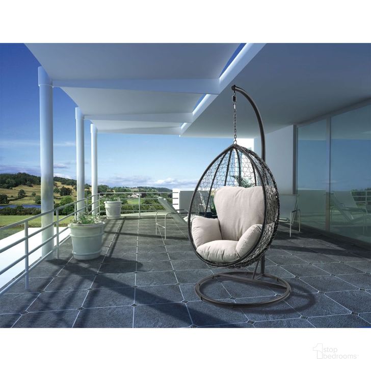 The appearance of Simona Patio Swing Chair w/ Stand (Beige/ Black) designed by ACME in the modern / contemporary interior design. This black piece of furniture  was selected by 1StopBedrooms from Simona Collection to add a touch of cosiness and style into your home. Sku: 45030CUS;45031FRM. Product Type: Outdoor Chair. Material: Resin. Image1