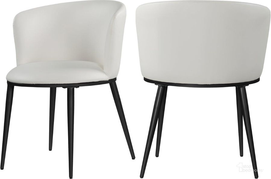 The appearance of Skylar White Faux Leather Dining Chair 966White-C Set of 2 designed by Meridian in the modern / contemporary interior design. This white piece of furniture  was selected by 1StopBedrooms from Skylar Collection to add a touch of cosiness and style into your home. Sku: 966White-C. Material: Faux Leather. Product Type: Dining Chair. Image1