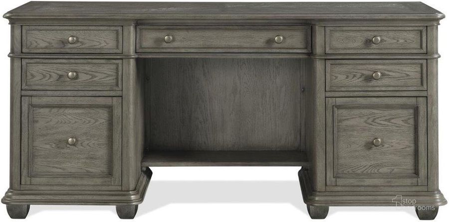 The appearance of Sloane Grey Wash Credenza Desk designed by Riverside Furniture in the transitional interior design. This gray piece of furniture  was selected by 1StopBedrooms from Sloane Collection to add a touch of cosiness and style into your home. Sku: 77933. Product Type: Credenza. Image1