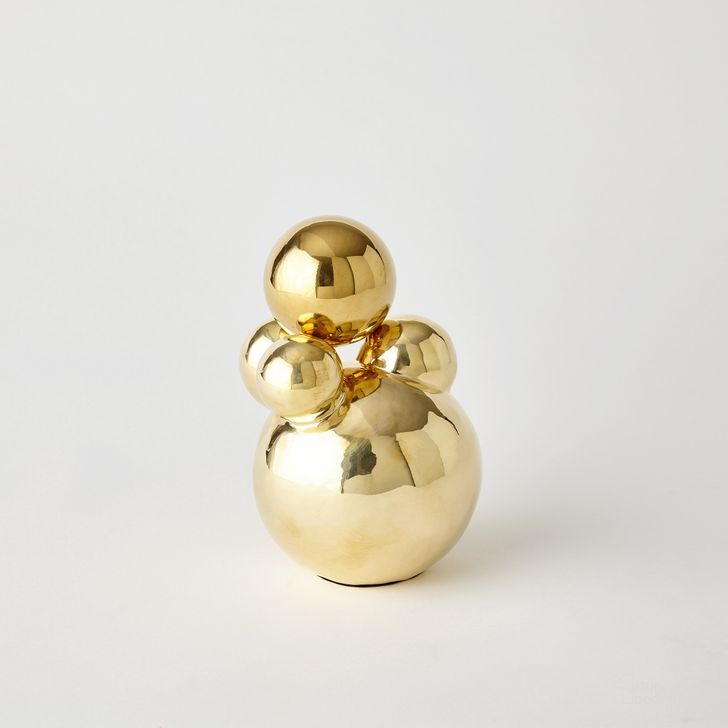 The appearance of Small Bubble Orb Holder In Brass With Brass Sphere designed by Global Views in the modern / contemporary interior design. This gold piece of furniture  was selected by 1StopBedrooms from Bubble Collection to add a touch of cosiness and style into your home. Sku: 8.83066. Product Type: Decorative Accessory. Material: Brass. Image1
