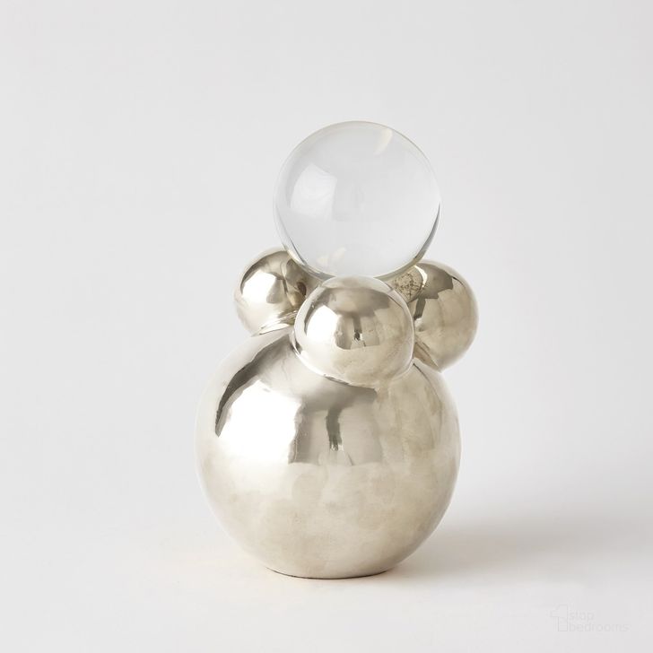 The appearance of Small Bubble Orb Holder In Nickel With Crystal Sphere designed by Global Views in the modern / contemporary interior design. This clear piece of furniture  was selected by 1StopBedrooms from Bubble Collection to add a touch of cosiness and style into your home. Sku: 8.83072. Product Type: Decorative Accessory. Material: Brass. Image1