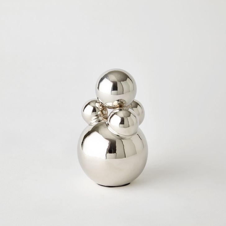 The appearance of Small Bubble Orb Holder In Nickel With Nickel Sphere designed by Global Views in the modern / contemporary interior design. This nickel piece of furniture  was selected by 1StopBedrooms from Bubble Collection to add a touch of cosiness and style into your home. Sku: 8.8307. Product Type: Decorative Accessory. Material: Brass. Image1