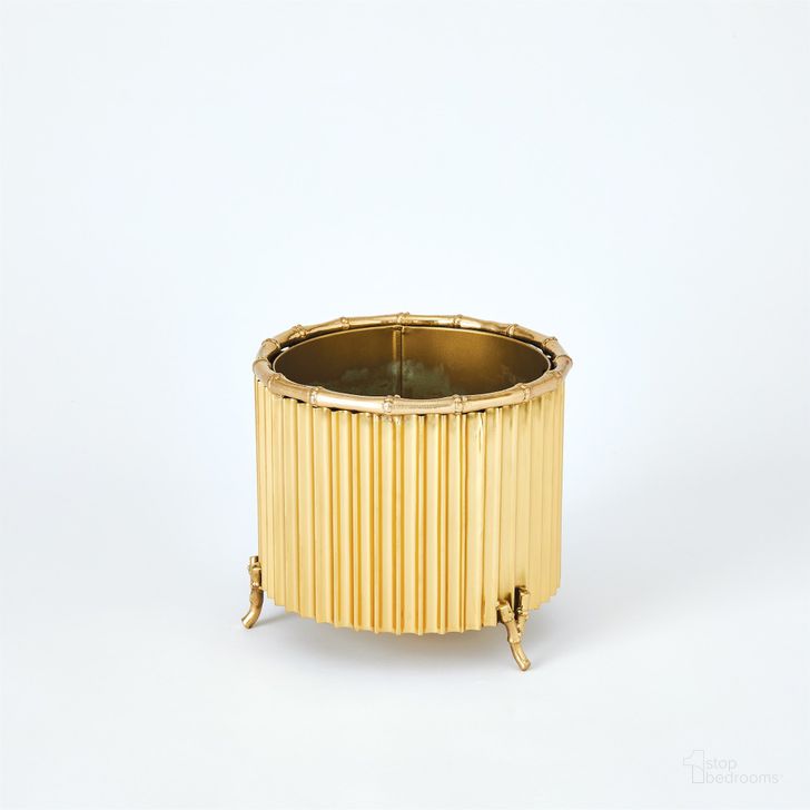 The appearance of Small Corrugated Bamboo Cachepot In Brass designed by Global Views in the modern / contemporary interior design. This brass piece of furniture  was selected by 1StopBedrooms from Corrugated Collection to add a touch of cosiness and style into your home. Sku: 9.91955. Product Type: Decorative Accessory. Material: Brass. Image1