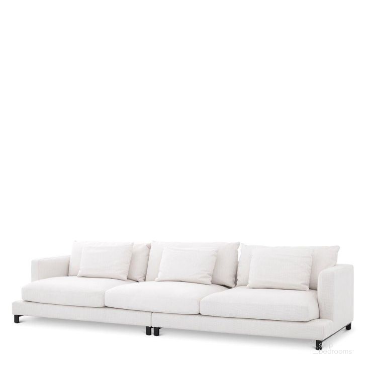 The appearance of Sofa Burbury Avalon White designed by Eichholtz in the modern / contemporary interior design. This white piece of furniture  was selected by 1StopBedrooms from Avalon Collection to add a touch of cosiness and style into your home. Sku: A114054A;A114054B. Product Type: Sofa. Image1