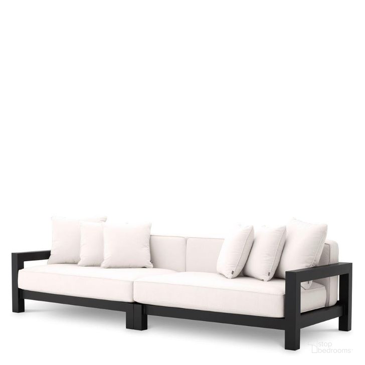 The appearance of Sofa Cap-Antibes Outdoor Black designed by Eichholtz in the modern / contemporary interior design. This black piece of furniture  was selected by 1StopBedrooms from Cap Collection to add a touch of cosiness and style into your home. Sku: 115006. Product Type: Outdoor Sofa. Material: Canvas. Image1