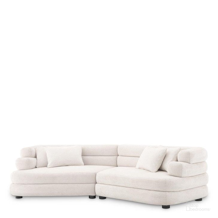 The appearance of Sofa Malaga L Lyssa Off-White designed by Eichholtz in the modern / contemporary interior design. This off white piece of furniture  was selected by 1StopBedrooms from Malaga Collection to add a touch of cosiness and style into your home. Sku: A116722A;A116722B. Product Type: Sofa. Image1