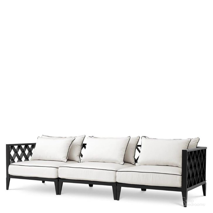 The appearance of Sofa Ocean Club Outdoor Black designed by Eichholtz in the modern / contemporary interior design. This black piece of furniture  was selected by 1StopBedrooms from Ocean Collection to add a touch of cosiness and style into your home. Sku: 113617A;113617B. Product Type: Outdoor Sofa. Image1