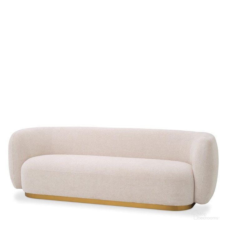 The appearance of Sofa Roxy Lyssa Off-White designed by Eichholtz in the modern / contemporary interior design. This off white piece of furniture  was selected by 1StopBedrooms from Roxy Collection to add a touch of cosiness and style into your home. Sku: A115136. Product Type: Sofa. Material: Brass. Image1