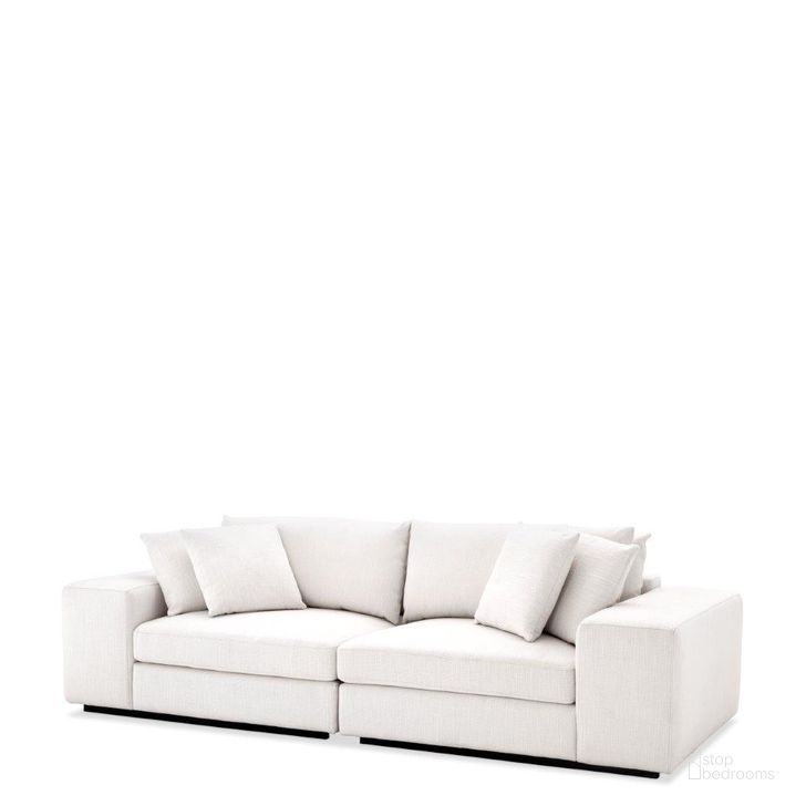 The appearance of Sofa Vista Grande Avalon White designed by Eichholtz in the modern / contemporary interior design. This white piece of furniture  was selected by 1StopBedrooms from Avalon Collection to add a touch of cosiness and style into your home. Sku: A112565A;A112565B. Product Type: Sofa. Image1