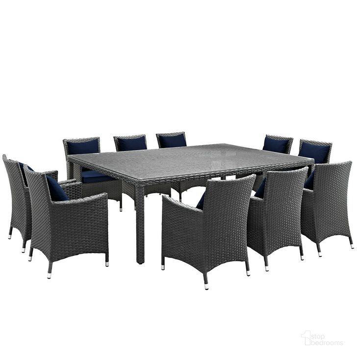 The appearance of Sojourn 11-Piece Outdoor Patio Sunbrella Dining Set In Canvas Navy designed by Modway in the modern / contemporary interior design. This canvas navy piece of furniture  was selected by 1StopBedrooms from Sojourn Collection to add a touch of cosiness and style into your home. Sku: EEI-2311-CHC-NAV-SET. Material: Rattan. Product Type: Outdoor Dining Set. Image1