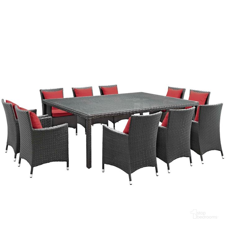 The appearance of Sojourn 11-Piece Outdoor Patio Sunbrella Dining Set In Canvas Red designed by Modway in the modern / contemporary interior design. This canvas red piece of furniture  was selected by 1StopBedrooms from Sojourn Collection to add a touch of cosiness and style into your home. Sku: EEI-2311-CHC-RED-SET. Material: Rattan. Product Type: Outdoor Dining Set. Image1
