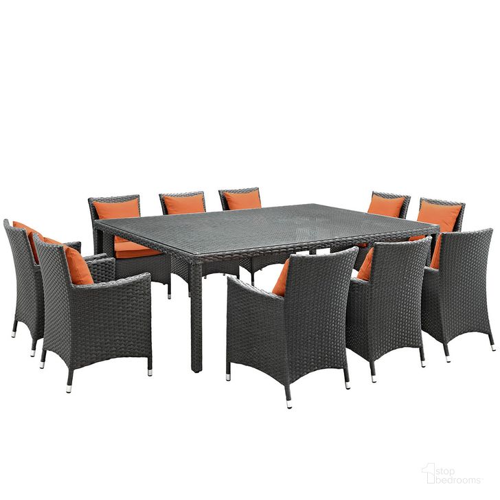 The appearance of Sojourn 11-Piece Outdoor Patio Sunbrella Dining Set In Canvas Tuscan designed by Modway in the modern / contemporary interior design. This canvas tuscan piece of furniture  was selected by 1StopBedrooms from Sojourn Collection to add a touch of cosiness and style into your home. Sku: EEI-2311-CHC-TUS-SET. Material: Rattan. Product Type: Outdoor Dining Set. Image1