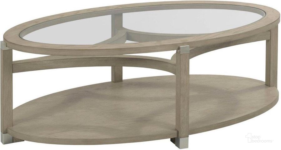 The appearance of Solstice Oval Coffee Table designed by Hammary in the modern / contemporary interior design. This light stain piece of furniture  was selected by 1StopBedrooms from Solstice Collection to add a touch of cosiness and style into your home. Sku: 086-912. Material: Wood. Product Type: Coffee Table.
