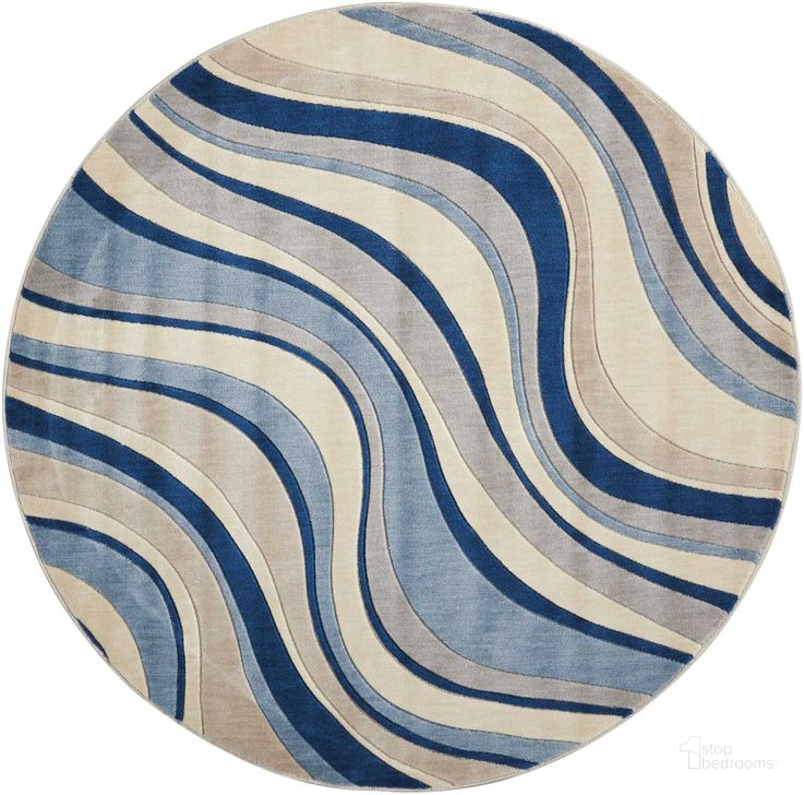 The appearance of Somerset Ivory And Blue 6 Round Area Rug designed by Nourison in the modern / contemporary interior design. This ivory and blue piece of furniture  was selected by 1StopBedrooms from Somerset Collection to add a touch of cosiness and style into your home. Sku: 99446312211. Material: Polyester. Product Type: Area Rugs. Image1