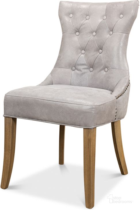 The appearance of Sophie Gray Leather Side Chair Set Of 2 designed by Sarreid in the transitional interior design. This grey piece of furniture  was selected by 1StopBedrooms from Sophie Collection to add a touch of cosiness and style into your home. Sku: 29970. Product Type: Dining Chair. Image1