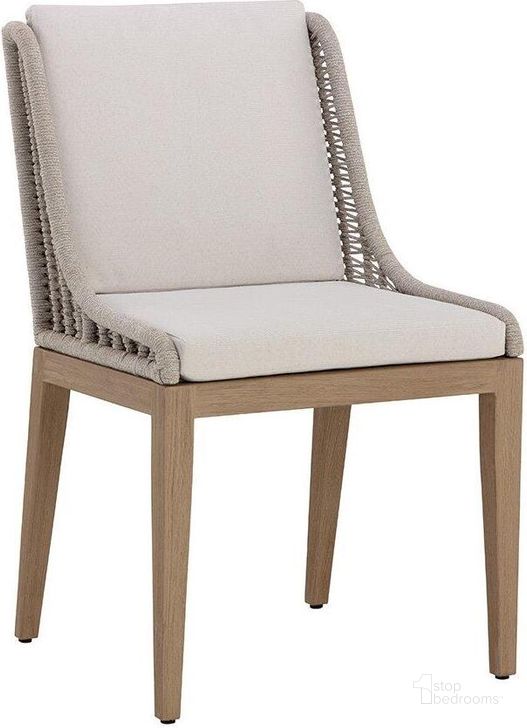 The appearance of Sorrento Dining Chair In Drift Brown And Palazzo Cream designed by Sunpan in the modern / contemporary interior design. This brown and cream piece of furniture  was selected by 1StopBedrooms from Sorrento Collection to add a touch of cosiness and style into your home. Sku: 110736. Material: Fabric. Product Type: Outdoor Dining Chair. Image1