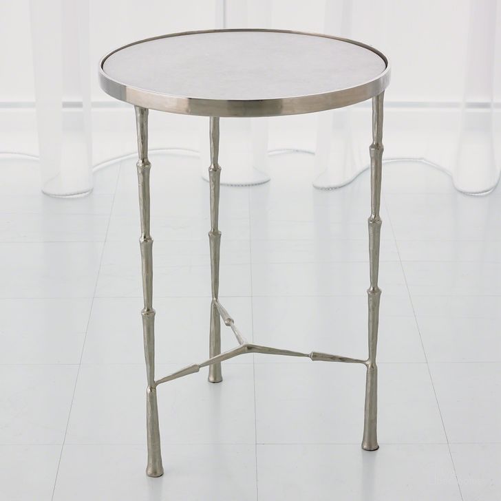 The appearance of Spike Accent Table In Antique Nickel With White Marble designed by Global Views in the modern / contemporary interior design. This white piece of furniture  was selected by 1StopBedrooms from Spike Collection to add a touch of cosiness and style into your home. Sku: 7.90509. Product Type: Accent Table. Material: Iron. Image1