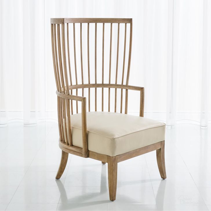 The appearance of Spindle Wing Chair In Beige Leather designed by Global Views in the modern / contemporary interior design. This white piece of furniture  was selected by 1StopBedrooms from Spindle Collection to add a touch of cosiness and style into your home. Sku: 7.20194. Material: Wood. Product Type: Chair. Image1