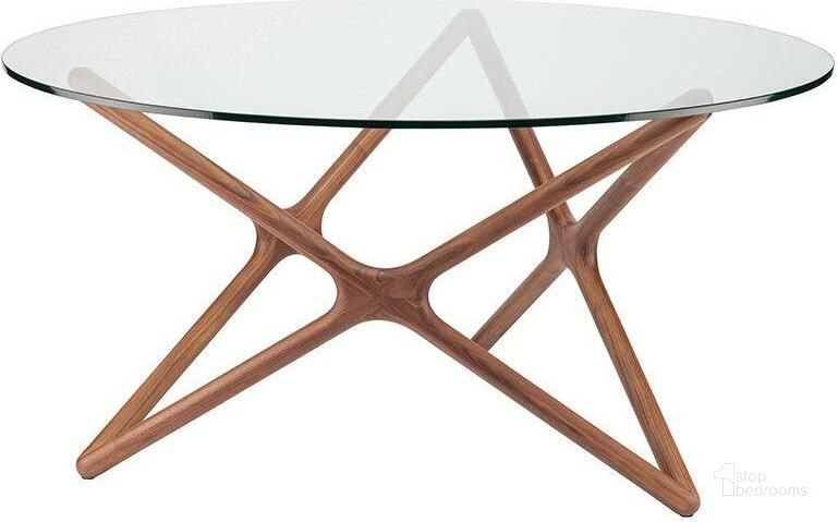 The appearance of Star Glass Glass Dining Table HGEM707 designed by Nuevo in the modern / contemporary interior design. This glass piece of furniture  was selected by 1StopBedrooms from Star Collection to add a touch of cosiness and style into your home. Sku: HGEM707. Table Base Style: Trestle. Table Top Shape: Round. Material: Glass. Product Type: Dining Table. Size: 59". Image1