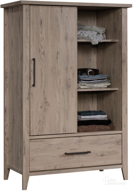 The appearance of Summit Station Armoire In Laurel Oak designed by Sauder in the transitional interior design. This laurel oak piece of furniture  was selected by 1StopBedrooms from Summit Station Collection to add a touch of cosiness and style into your home. Sku: 425011. Product Type: Armoire. Material: Engineered Wood. Image1
