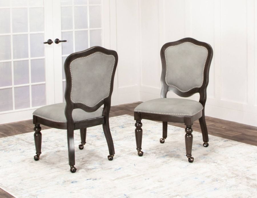 The appearance of Sunset Trading Vegas Gaming And Dining Chair Distressed Gray Wood Nailheads Casters Set Of 2 designed by Sunset Trading in the modern / contemporary interior design. This dark gray piece of furniture  was selected by 1StopBedrooms from Vegas Collection to add a touch of cosiness and style into your home. Sku: CR-87711-05-RTA. Material: Wood. Product Type: Dining Chair. Image1