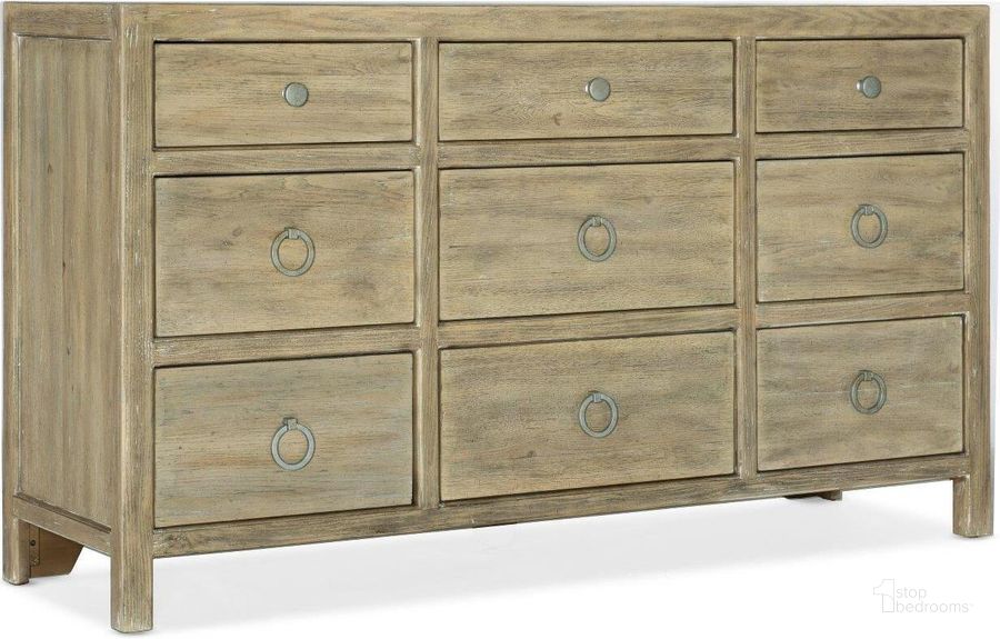 The appearance of Surfrider Nine-Drawer Dresser designed by Hooker in the transitional interior design. This light wood piece of furniture  was selected by 1StopBedrooms from Surfrider Collection to add a touch of cosiness and style into your home. Sku: 6015-90202-80. Material: Wood. Product Type: Dresser. Image1