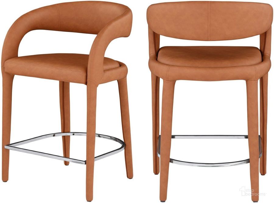 The appearance of Sylvester Cognac Faux Leather Stool designed by Meridian in the modern / contemporary interior design. This cognac piece of furniture  was selected by 1StopBedrooms from Sylvester Collection to add a touch of cosiness and style into your home. Sku: 989Cognac-C. Material: Faux Leather. Product Type: Stool. Image1