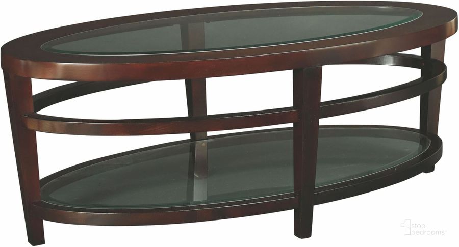 The appearance of Urbana Dark Merlot Oval Cocktail Table designed by Hammary in the transitional interior design. This brown piece of furniture  was selected by 1StopBedrooms from Urbana Collection to add a touch of cosiness and style into your home. Sku: T20810-T2081506-00. Table Top Shape: Oval. Material: Glass. Product Type: Cocktail Table. Image1