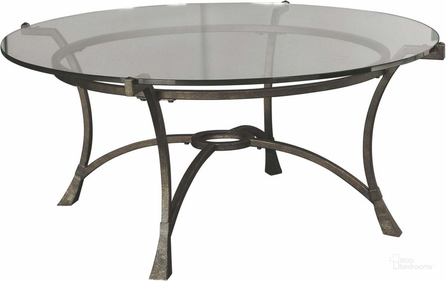 The appearance of Sutton Round Cocktail Table designed by Hammary in the modern / contemporary interior design. This brown piece of furniture  was selected by 1StopBedrooms from Sutton Collection to add a touch of cosiness and style into your home. Sku: T30026-T3002605-00R. Material: Metal. Product Type: Cocktail Table. Image1